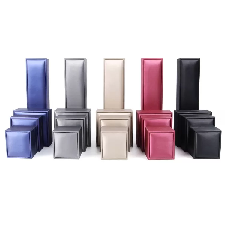 Wholesale set of peacock blue rigid jewelry boxes for branding.