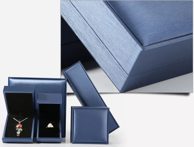 Close up of brushed hairline texture on peacock blue leatherette.