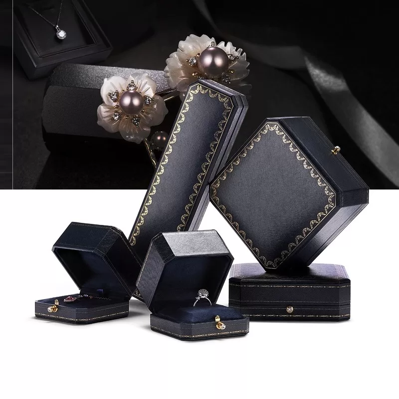 Wholesale vintage octagonal jewelry box set in red and blue with gold foil details