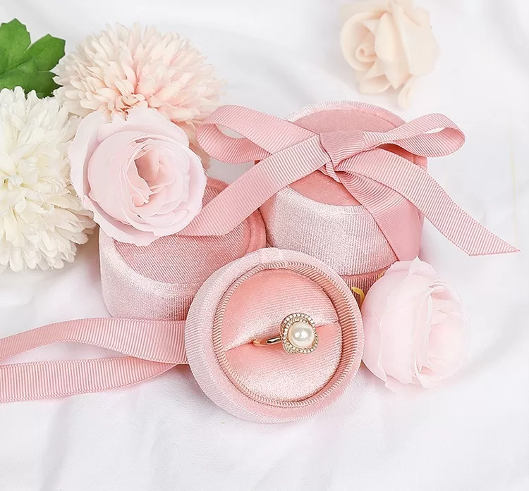 Close up of satin ribbon bow on corduroy box