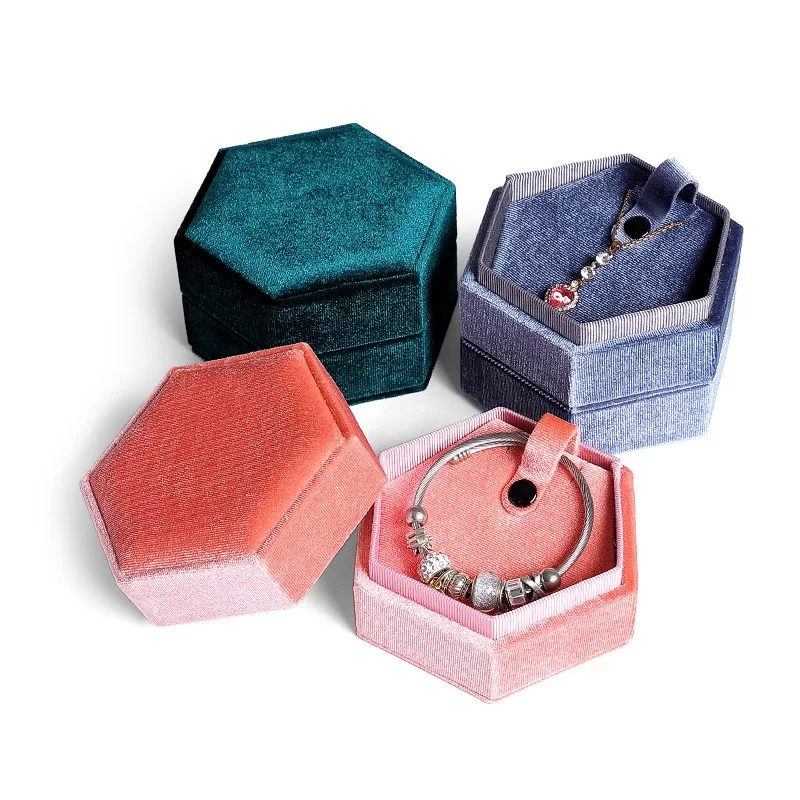Open view of hexagon lid and base jewelry box with velvet insert