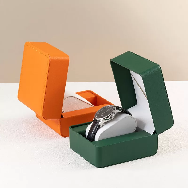 Open view of stitched watch box featuring dual-tone interior cushion