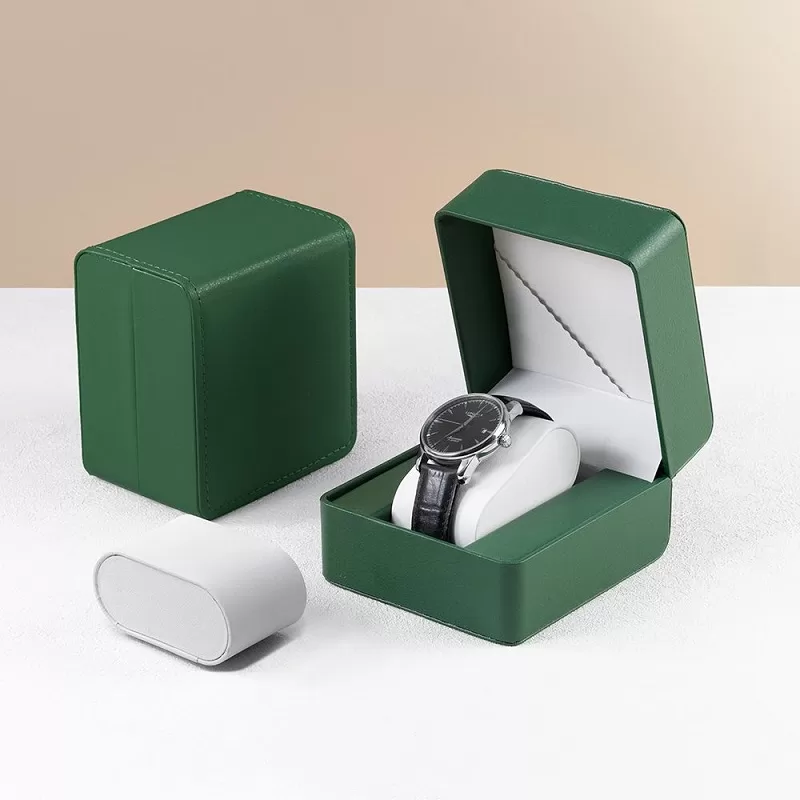 Close up of stitching detail on black and brown leather watch box