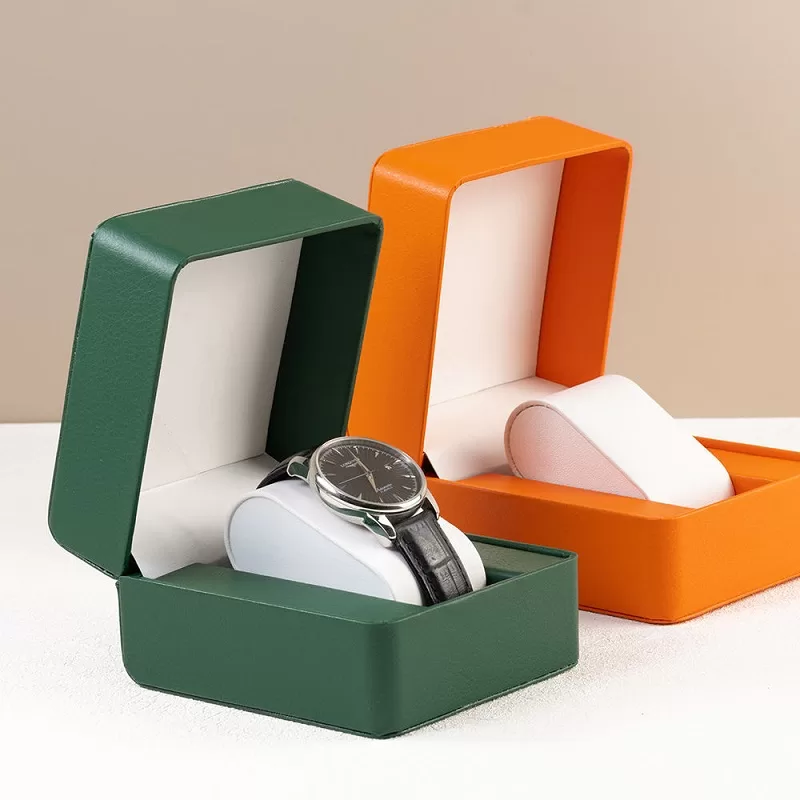 Open view of stitched watch box featuring dual-tone interior cushion