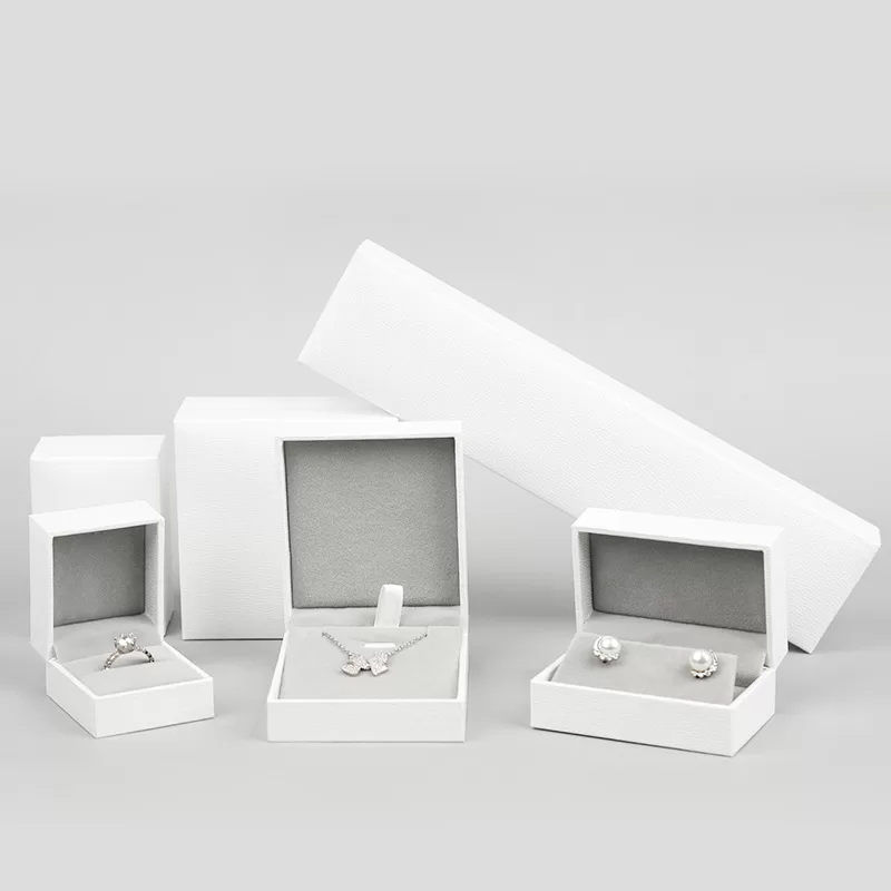 Large square white jewelry set box for bridal necklace packaging.