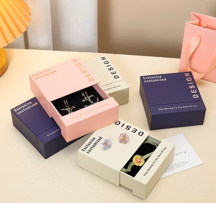 Luxury necklace displayed inside a slide-style cardboard gift box