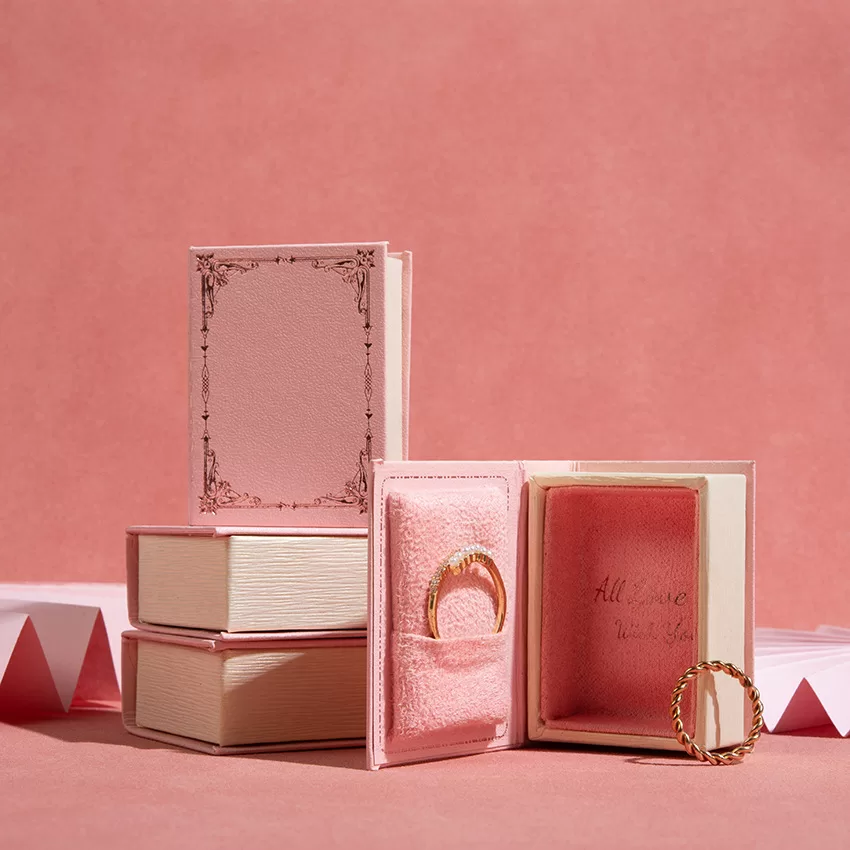 Open view of creative book ring box with magnetic closure