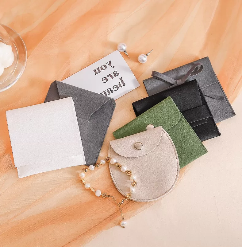 custom logo jewelry pouch bulk order,Compact jewelry roll bag for daily use, Customizable jewelry gift bag bulk order,Custom-printed jewelry bags with logo