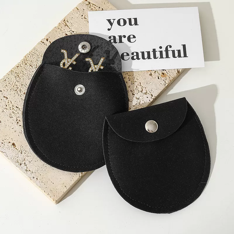 Dark green microfiber jewelry pouch with snap closure wholesale