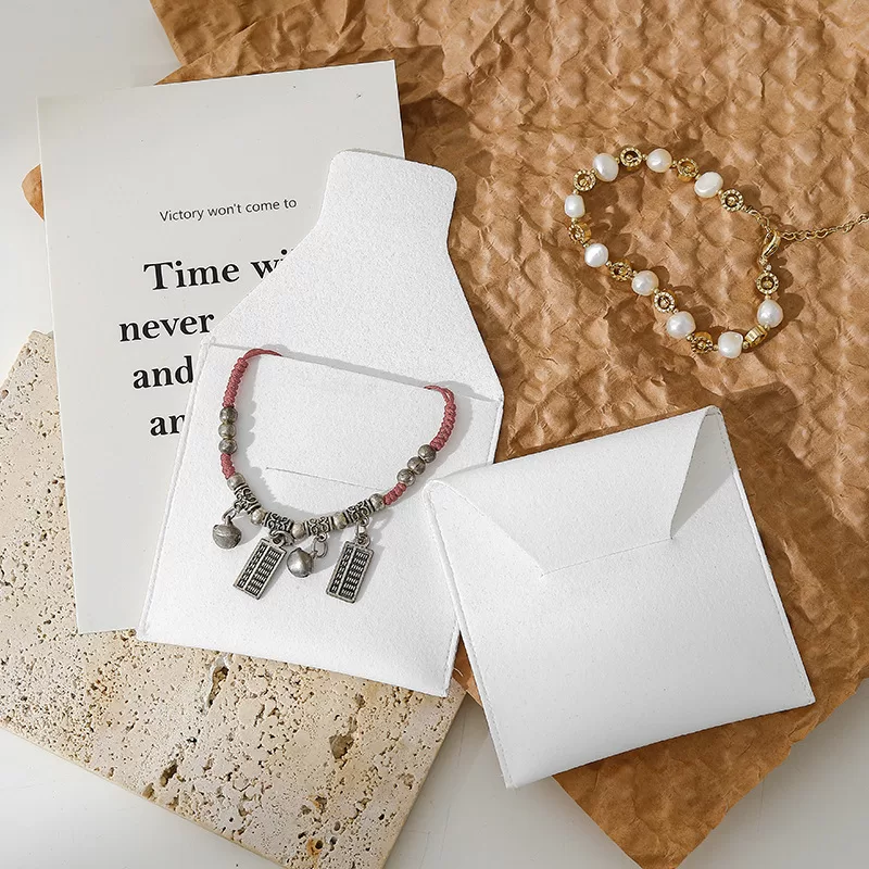 Custom logo jewelry pouch bulk order,Compact jewelry roll bag for daily use,Customizable jewelry gift bag bulk order,Custom-printed jewelry bags with logo