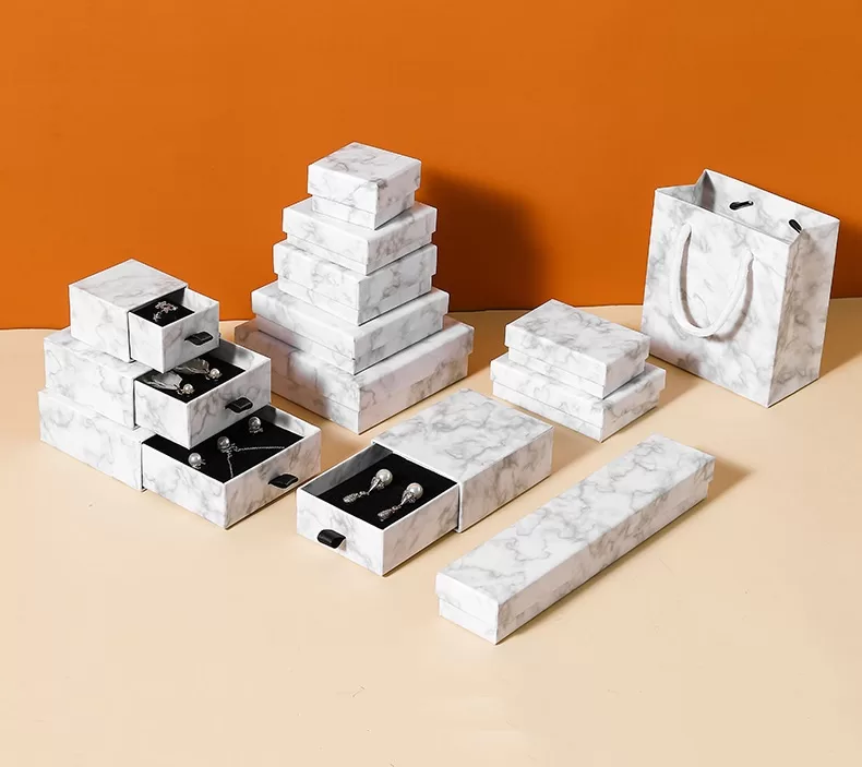 Matching paper bag and slide box set for jewelry retail