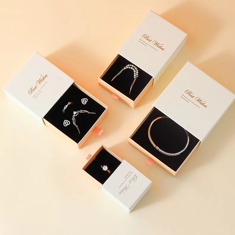 Side angle of two-tone drawer box showing contrast between sleeve and inner tray