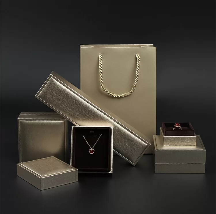 Gold specialty paper jewelry box with sharp right angles wholesale