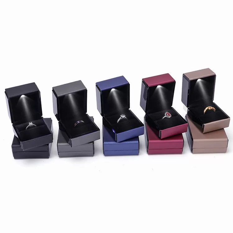 Wholesale set of LED lighted pendant and ring boxes.