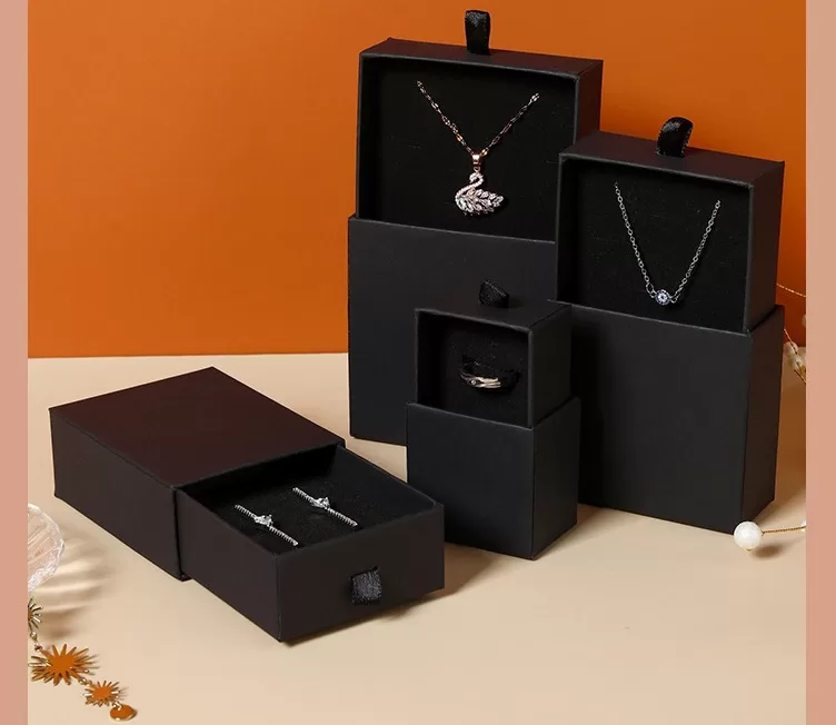Collection of wholesale black drawer jewelry boxes in various sizes