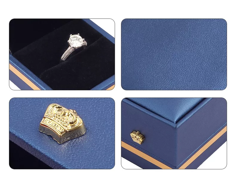 Rectangular green leather chain box with gold trim for bracelets.