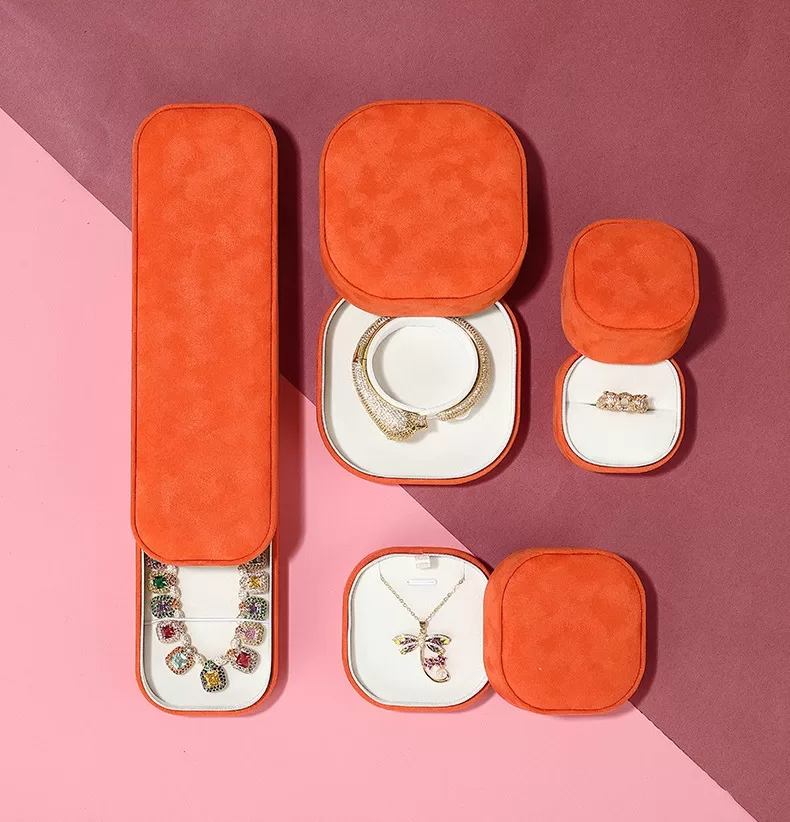 Small orange round corner velvet ring box for wedding proposals
