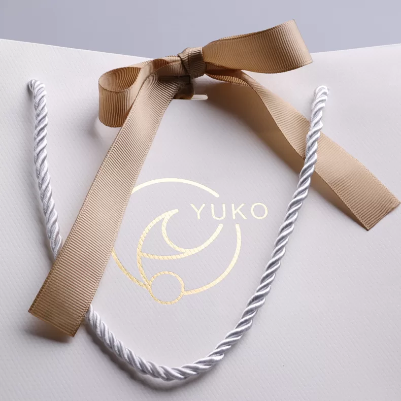 gift bag with ribbon tie,bag of gift bows,bow gift bag,gift bags and bows