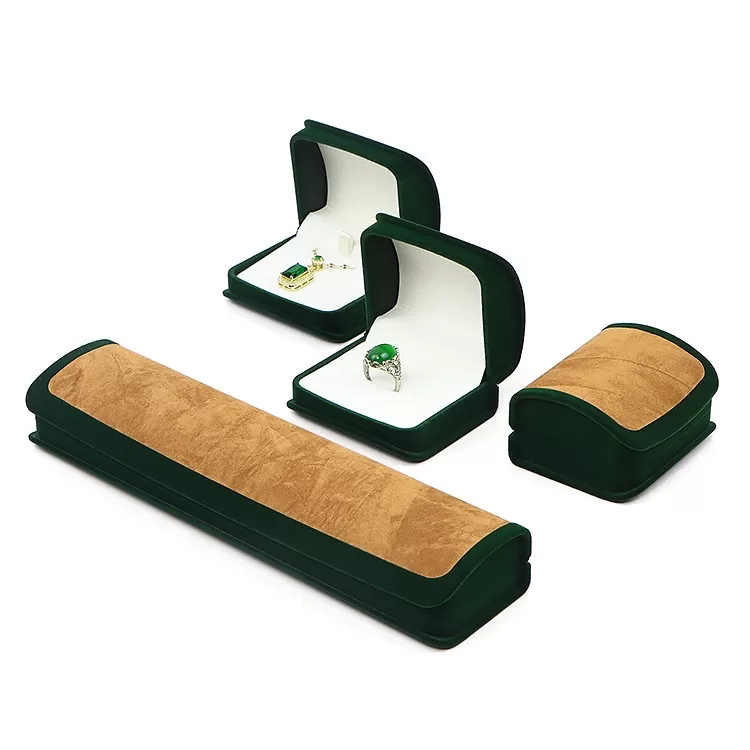 Close up of soft flocking texture on color-blocked jewelry packaging.