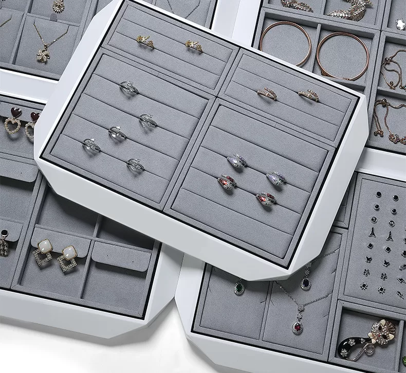Complete set of white lacquer jewelry displays with gray microfiber interior