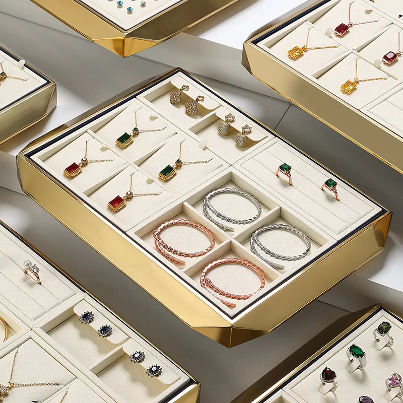 Full set of gold and beige jewelry display props for retail counter