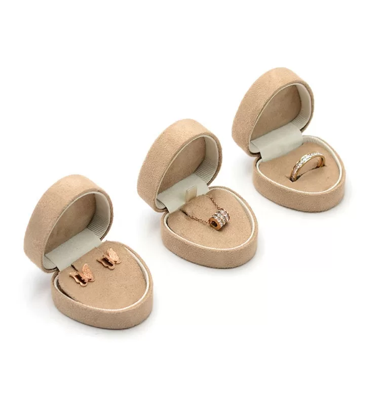 Pink heart-shaped faux suede jewelry case for earrings