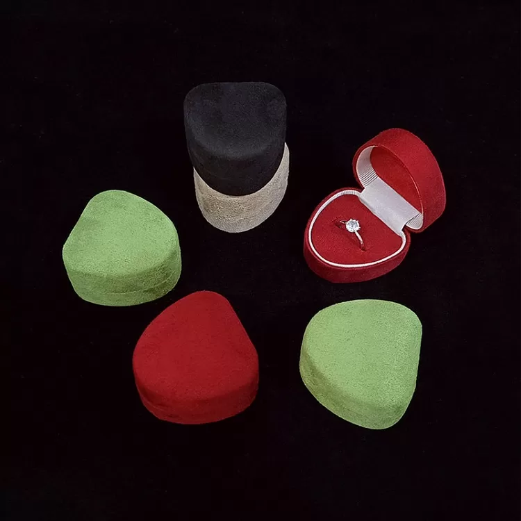 Side view of sturdy heart shaped ring case with durable construction