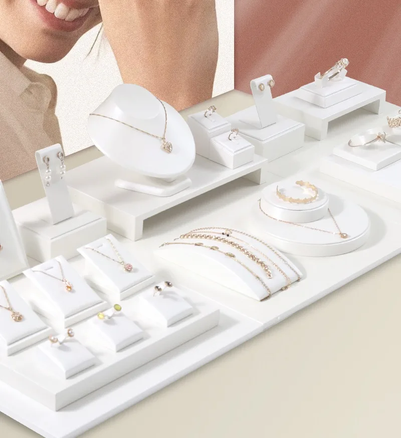 Complete set of 36 white brushed PU leather jewelry display props for retail