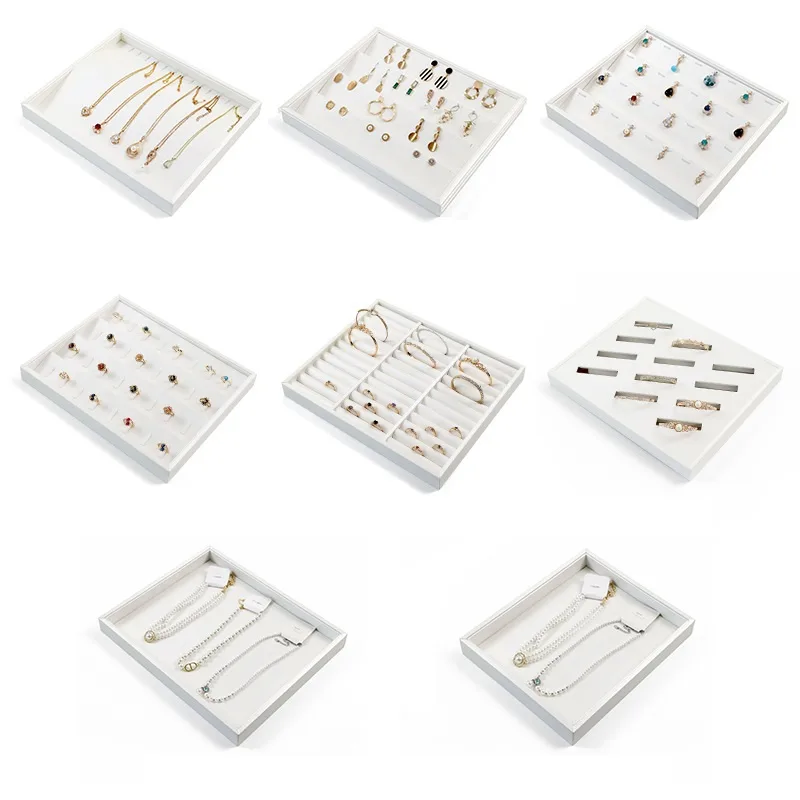All-white brushed PU leather jewelry display trays for retail showcase